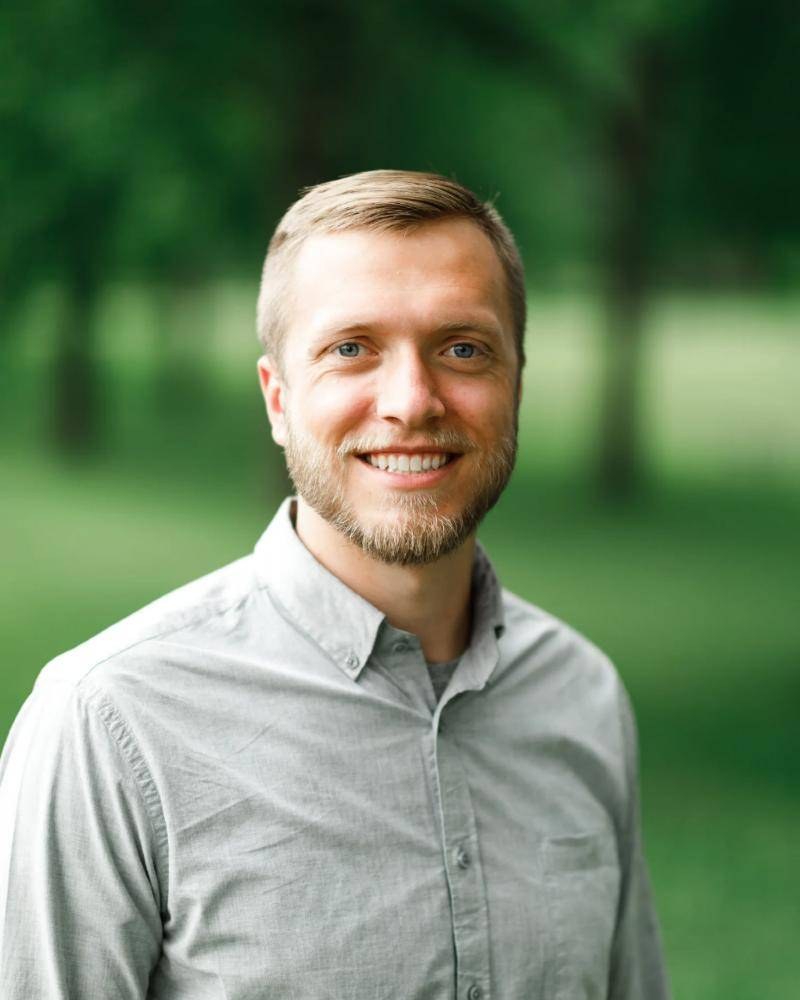 Portrait of Luke Engel smiling outdoors