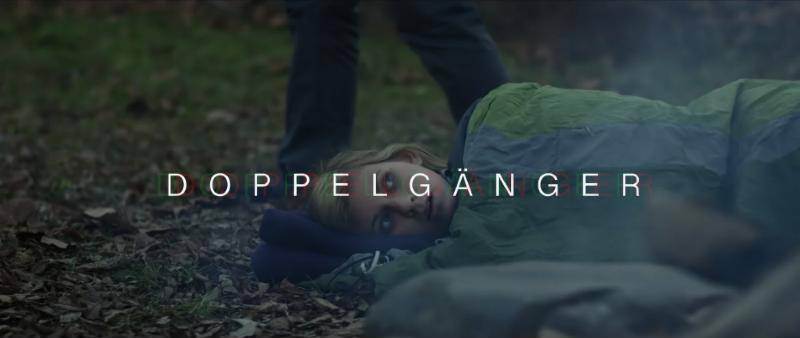 Doppelgänger title card over a boy lying on the forest floor